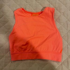 Lululemon bright orange high neck performance sports bra with mesh back. Size 2.